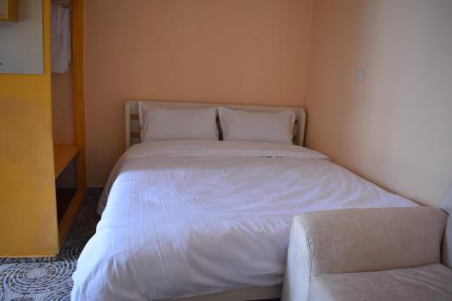 Postel nebo postele na pokoji v ubytování Greens Apartment Zimmerman
