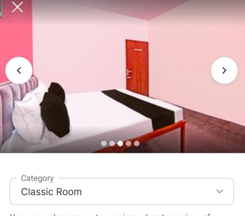 Postel nebo postele na pokoji v ubytování FLAMINGO Inn