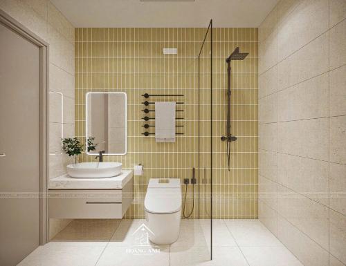 a bathroom with a toilet and a sink and a shower at Tuỳ Tâm Luxury Hotel Quảng Trị in Ðông Hà