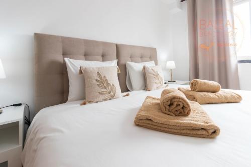 Ένα ή περισσότερα κρεβάτια σε δωμάτιο στο Baleal Beach Stay
