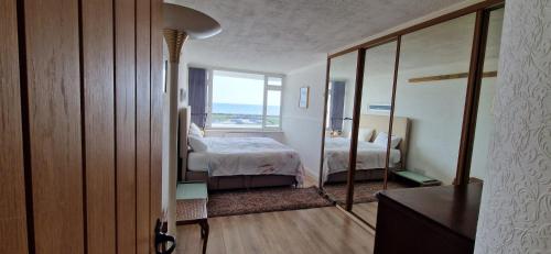 Postel nebo postele na pokoji v ubytování East Lodge 20