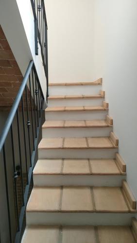 a set of stairs leading up to a building at B&B Nonno Peppe in Spoltore