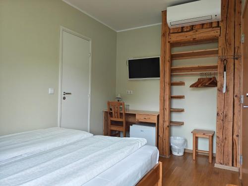 Postel nebo postele na pokoji v ubytování Aisa Accommodation