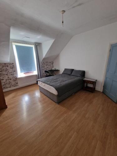 Ένα ή περισσότερα κρεβάτια σε δωμάτιο στο Princess Homestay