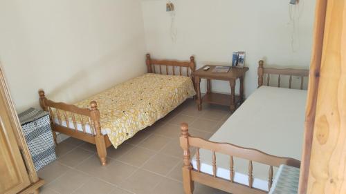 Postel nebo postele na pokoji v ubytování Three lindens