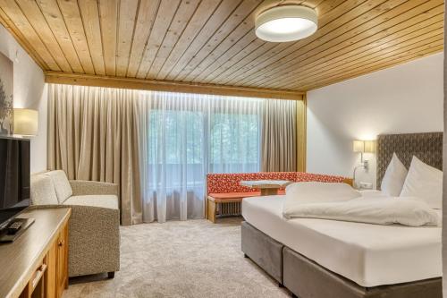 Posteľ alebo postele v izbe v ubytovaní Hotel Klausnerhof