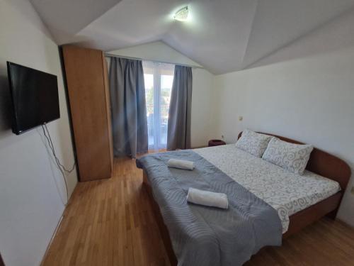 Postel nebo postele na pokoji v ubytování Apartment Stefan