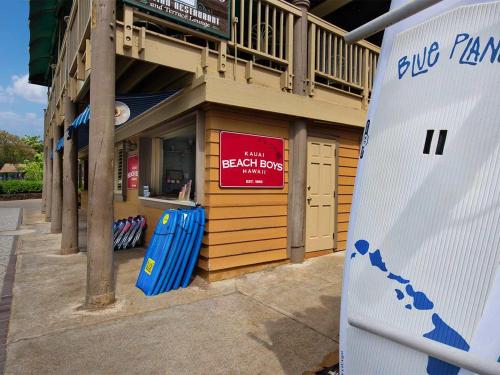 a baseball room with a sign on the side of a building at Marriott Kauai Beach Club Parlor Apartment with Resort Access in Lihue