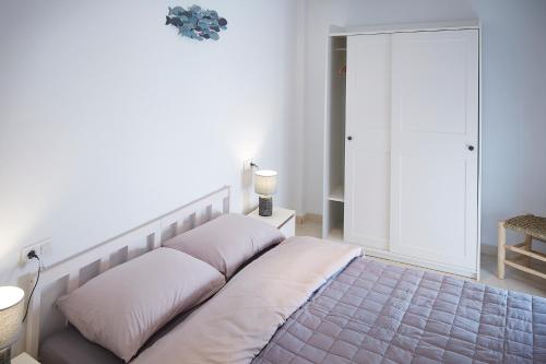 Cama o camas de una habitación en Casa los pececitos