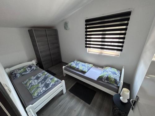 Katil atau katil-katil dalam bilik di Holiday home Lucas with pool