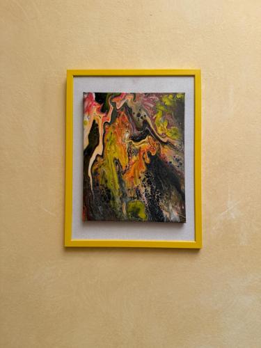 a picture of a painting hanging on a wall at ART hotel MAXIM in Frýdek-Místek