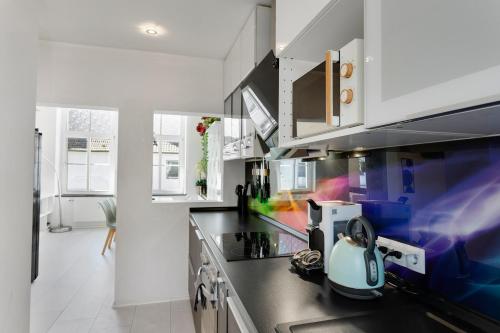 Η κουζίνα ή μικρή κουζίνα στο Moderne & Rustikale Wohnung I Zentral I Geschäftsreisen I Top Anbindung