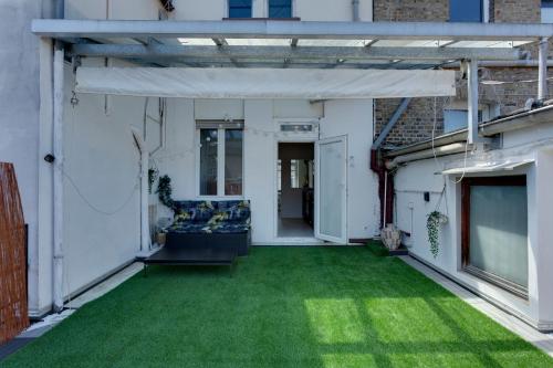 Κήπος έξω από το Moderne & Rustikale Wohnung I Zentral I Geschäftsreisen I Top Anbindung