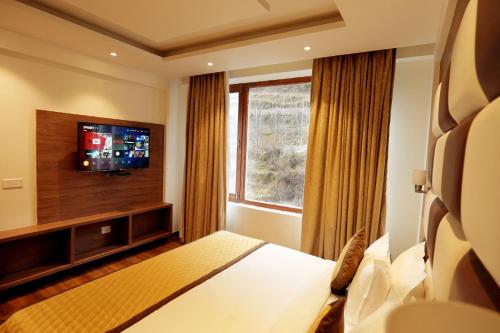 Televisyen dan/atau pusat hiburan di The Jungle Mountain Retreat