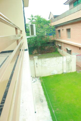 a view from the balcony of a building at Golf View Lodges in Abbottabad