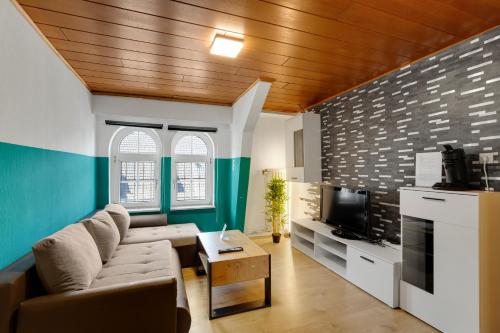 Μια τηλεόραση ή/και κέντρο ψυχαγωγίας στο Moderne & Rustikale Wohnung I Zentral I Geschäftsreisen I Top Anbindung