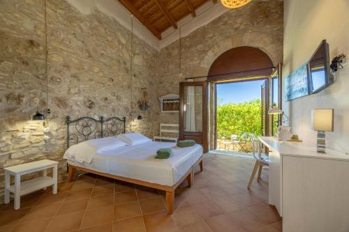 Postel nebo postele na pokoji v ubytování Casale La Macina - Hotel, Scopello