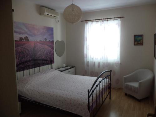 Posteľ alebo postele v izbe v ubytovaní Apartments & Rooms Abba