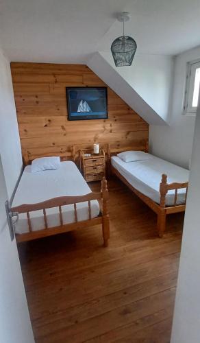 Llit o llits en una habitació de Ty sioul