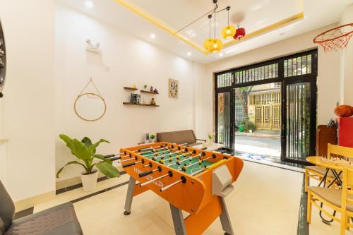 a game room with a foosball table at Close to My Khe Beach I Food street I Sóng Homestay in Da Nang