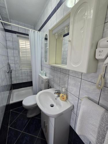 Koupelna v ubytování Guesthouse Anton