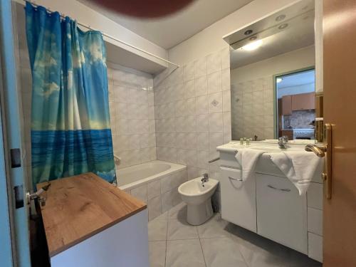 a bathroom with a sink and a toilet and a shower at Aparthotel Mariazellerhof in Sankt Pölten