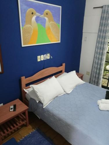 Postel nebo postele na pokoji v ubytování Pousada Estrada Real