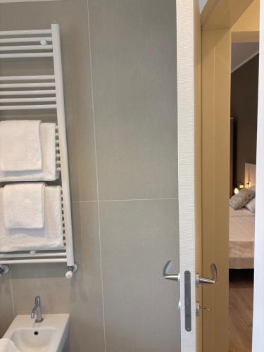 a bathroom with a sink and a mirror at Studio Venice Mestre Centrale in Venice