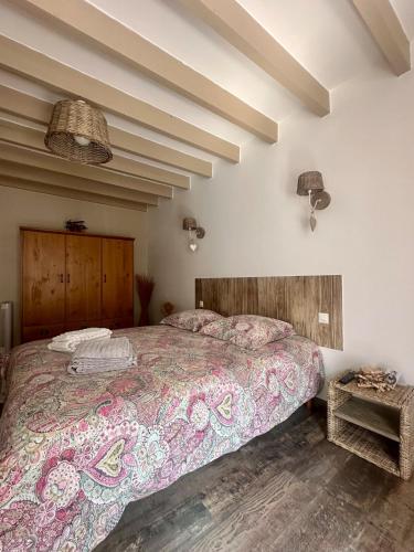 Llit o llits en una habitació de gîte le nid
