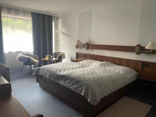 Una cama o camas en una habitación de Gasthaus Balduin, mitten in der Natur, direkt am Fluss