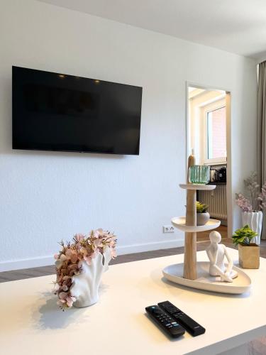 Et tv og/eller underholdning på REGENCY Apartments - City Wohnung I Balkon I WLAN I Netflix I Parkplätze