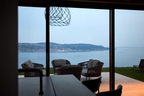 a room with a view of a basketball hoop at Colago Private Villas Lake Garda in Toscolano Maderno