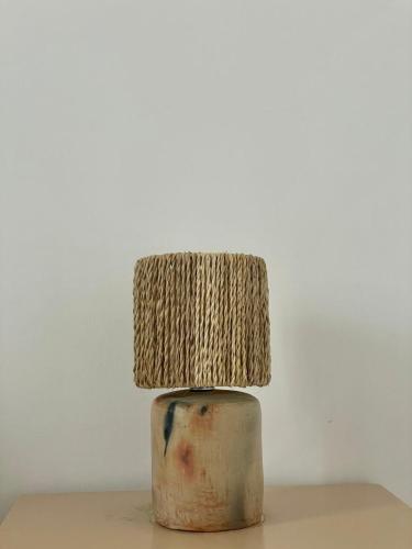 a lamp sitting on top of a table at Olivia sidibou in Sidi Bou Saïd