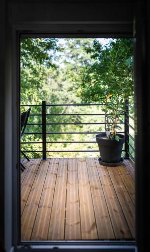 Balkoni atau teres di Golbey Evasion Terrasse et Parking
