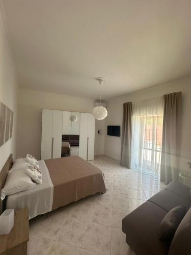 Postel nebo postele na pokoji v ubytování Elysium Guesthouse