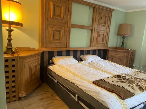 Postel nebo postele na pokoji v ubytování Erdgeschosswohnung mit separatem Eingang