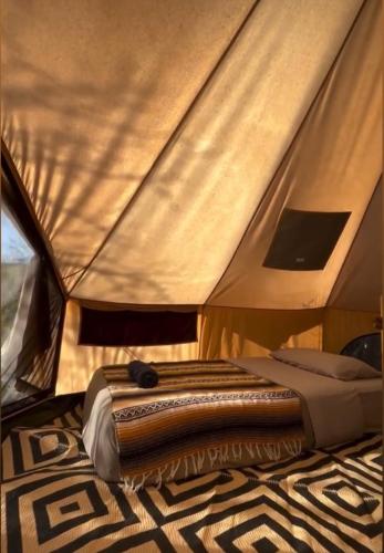 Ένα ή περισσότερα κρεβάτια σε δωμάτιο στο Libra Eco-Adventure Hostel