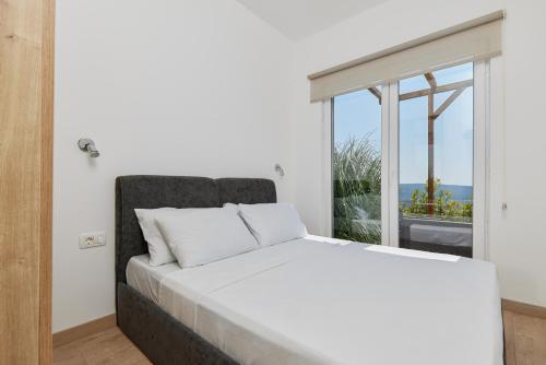 Una cama o camas en una habitación de Adriatic Heights