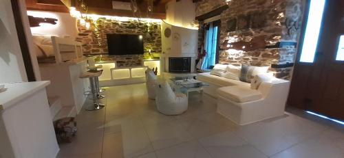 Televisyen dan/atau pusat hiburan di Relax Holistic House