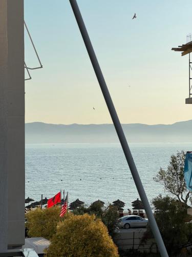 a view of the ocean from a building at Stylish Apartment 50m from Radhimë Beach in Vlorë