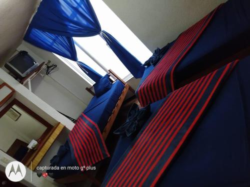 TV a/nebo společenská místnost v ubytování Hotel Diamantes Orizaba Boutique