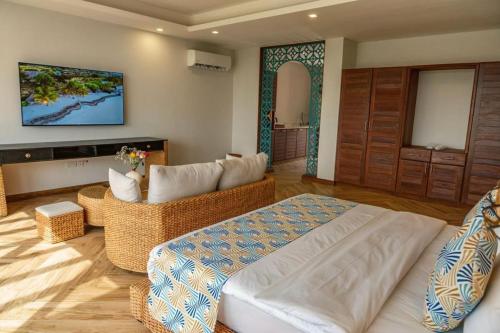 Galería fotográfica de Premium room sea view en Fumba