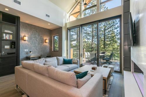 a living room with a couch and a table at Crystal Bay Penthouse 301 condo in Crystal Bay