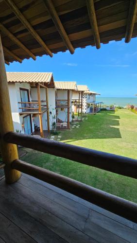 a view from the deck of a house at Kamaiurá Pousada in Caraíva
