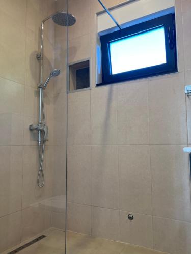 Ένα μπάνιο στο Apartmani na Uni Šarac