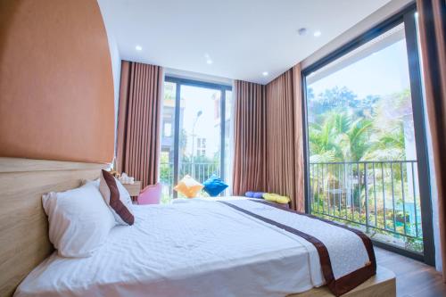 Ένα ή περισσότερα κρεβάτια σε δωμάτιο στο Newlife Villa Flamingo Hải Tiến