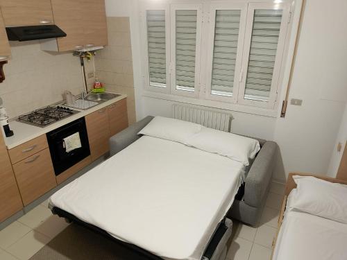 Kuchyň nebo kuchyňský kout v ubytování Hotel Fioralba