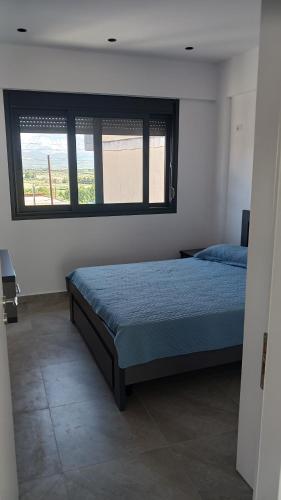 Postel nebo postele na pokoji v ubytování Vana's Apartments