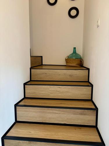 a set of stairs with a vase on the top at Casa Halcón in Jávea