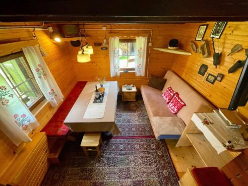 an overhead view of a living room in a tiny house at Vacation cottage house Enya in Koprivnik v Bohinju
